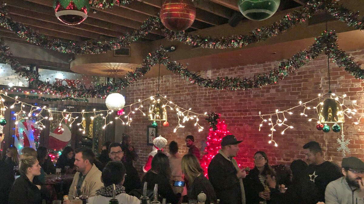 The Red Rabbit Kitchen & Bar has returned its “Miracle” pop-up for the holiday season, with Christmas decorations and presents, as shown in this 2019 photo.