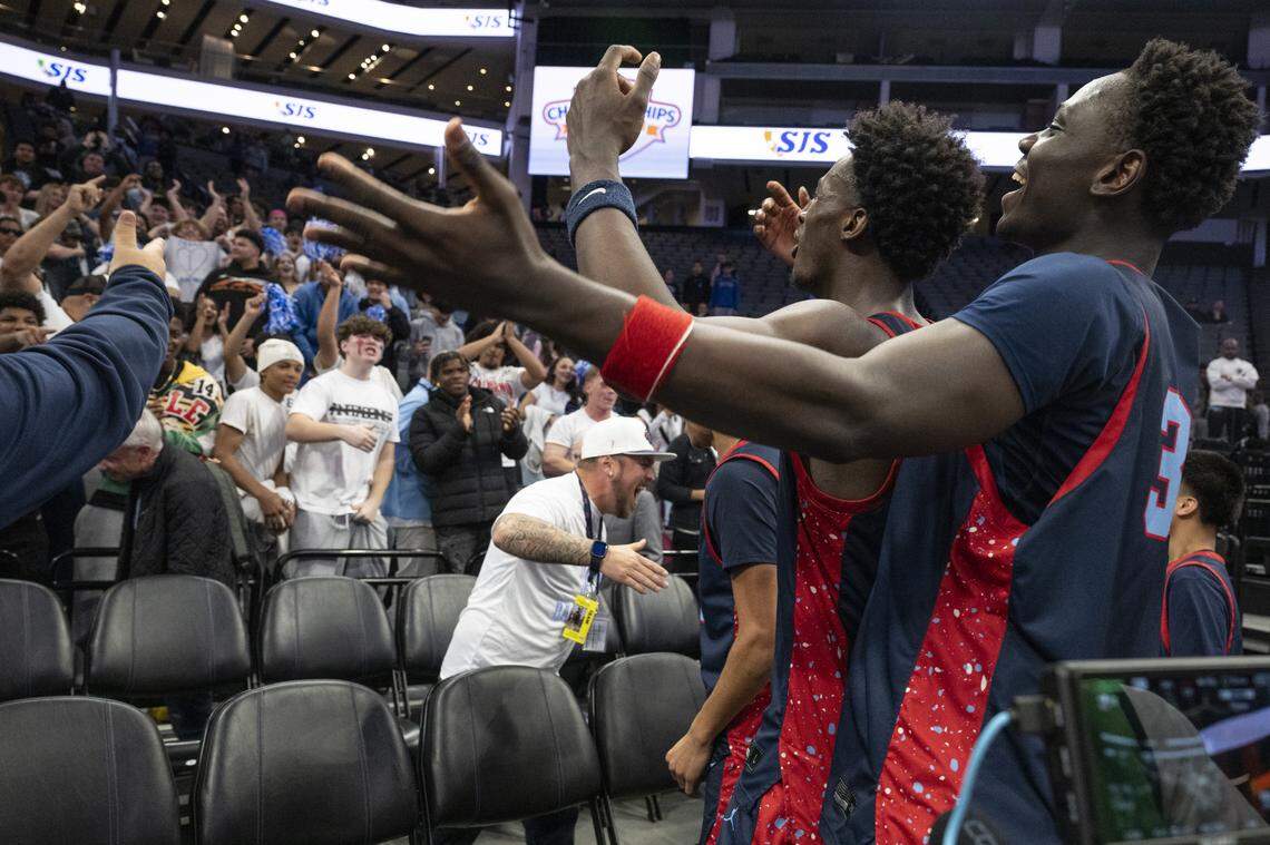 Destiny Christian Academy reacts after winning the CIF Sac-Joaquin Section Division II boys basketball championship at Golden 1 Center in Sacramento on Friday. 