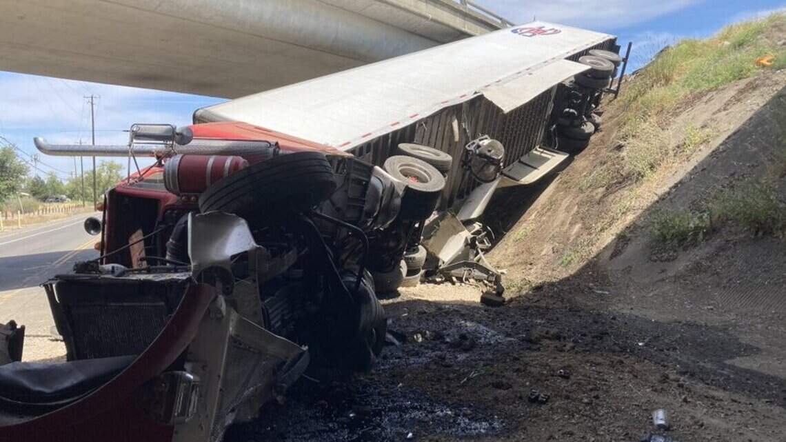 Big rig rolls off I-5 overpass onto San Juan Road in Sacramento, driver hospitalized