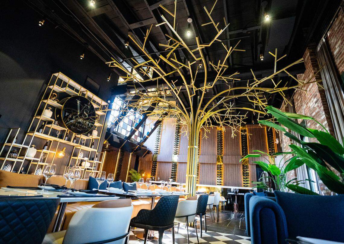 A golden tree stands in the center of the Paradise Room of V’s Paradise in Old Sacramento on Thursday.