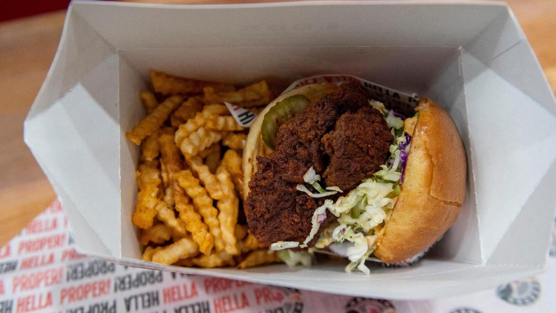 ‘The Sammich’ is the most popular item at Nash and Proper and sits on the bar in downtown Sacramento on Thursday, Sept. 24, 2020. Nash and Proper just opened a takeout shop on K Street and the owner, Cecil Rhodes, says the chicken sammich is the most popular dish. ‘The Sammich’ is a fried crispy chicken thigh, slaw, fuego sauce, and pickles on a butter bun.