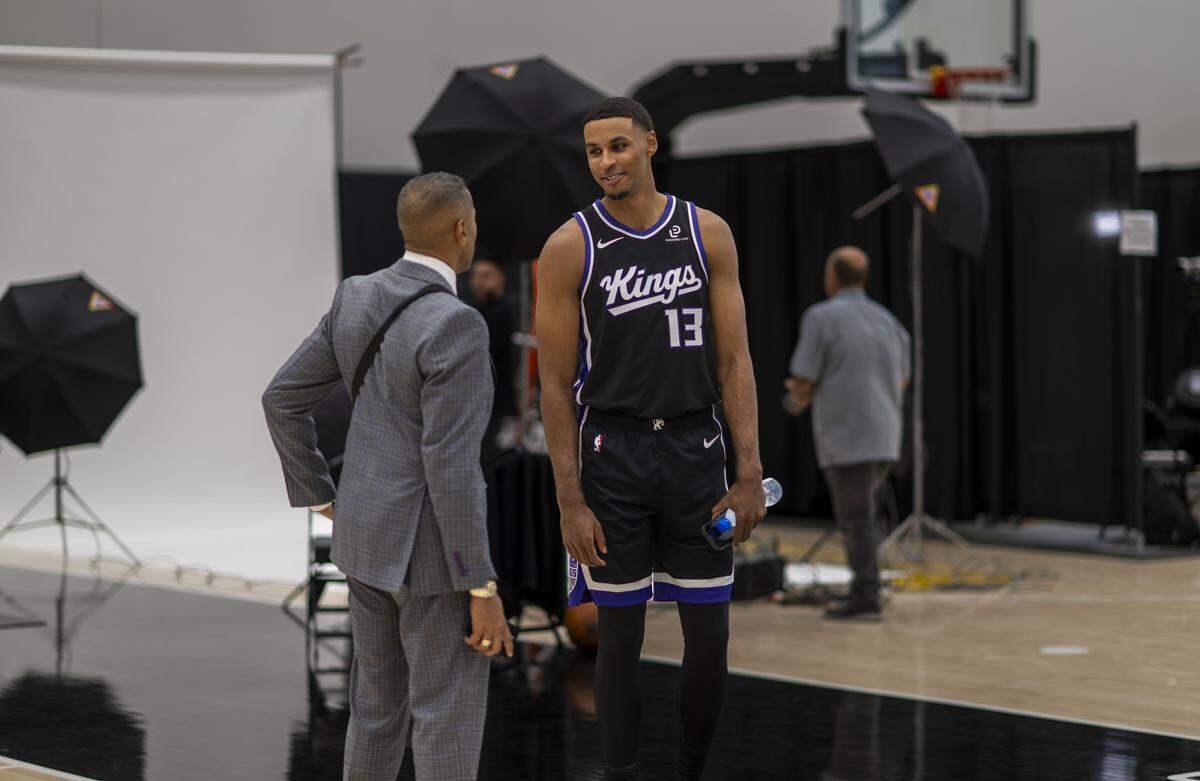 Announcer Mark Jones speaks with Sacramento Kings forward Keegan Murray (13) during media day at Golden 1 Center on Monday.