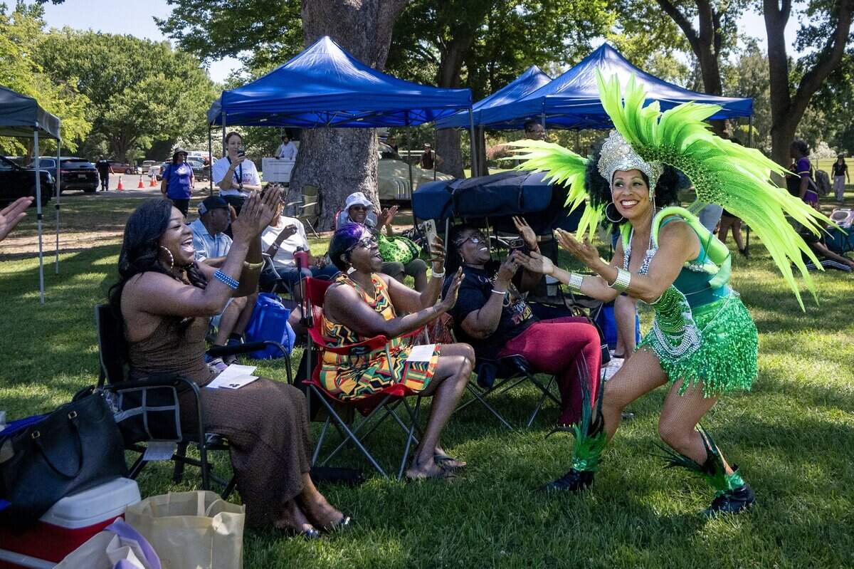 Marta Santos of Samba de Tierra During performs at the Juneteenth event in Land Park on Saturday, June 20, 2026, in Sacramento.