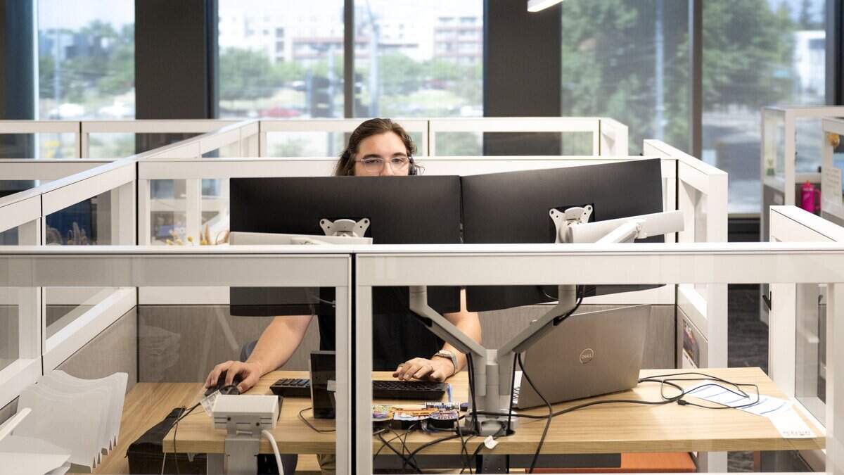 Customer service representative Brandon Taylor handles calls at the California Department of Tax and Fee Administration call center on Wednesday, Sept. 4, 2025. CDTFA was part of a pilot program to streamline the hiring process for prospective state workers.