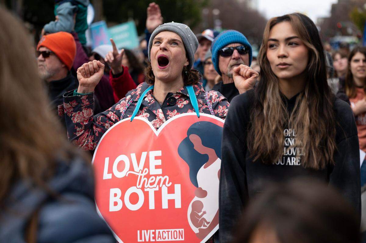 Abortion opponent Lisa Kennedy of Auburn cheers for speakers during the 2023 California March For Life at the state Capitol in Sacramento on Monday, March 6, 2023.
