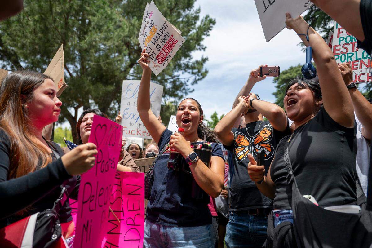 Rafa Garcia celebrates after forming a dance circle near the state Capitol during the “No Kings” protest against the Trump administration in downtown Sacramento on Saturday.