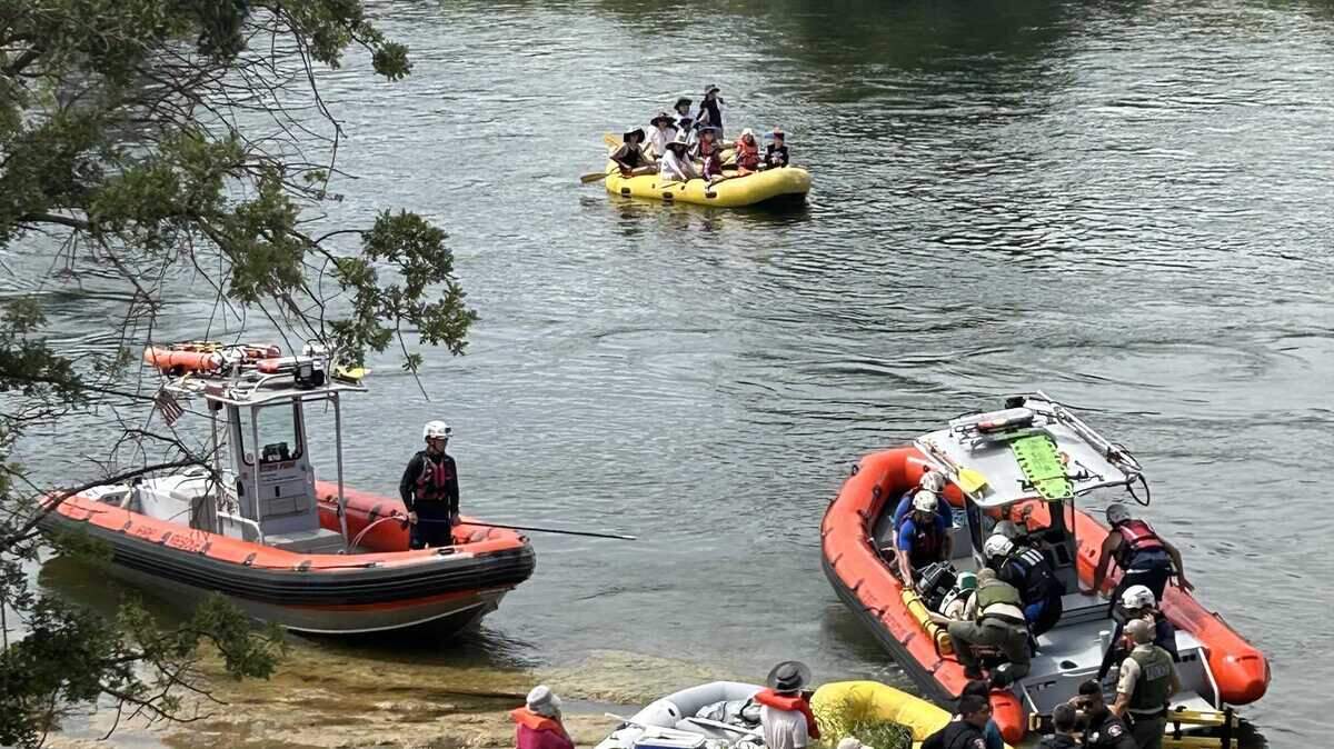 Authorities pull Steven Lee, a San Francisco postal carrier, from the American River in a water rescue attempt on July 23 near Rancho Cordova. Lee was taken to a hospital where he died.