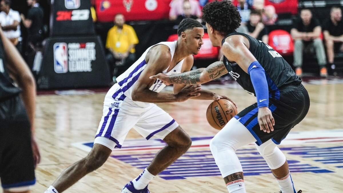 Sacramento Kings rookie Keegan Murray drives against Orlando Magic rookie Paolo Banchero during a Las Vegas Summer League Game on Saturday, July 9, 2022, at Thomas & Mack Center in Las Vegas, Nevada.