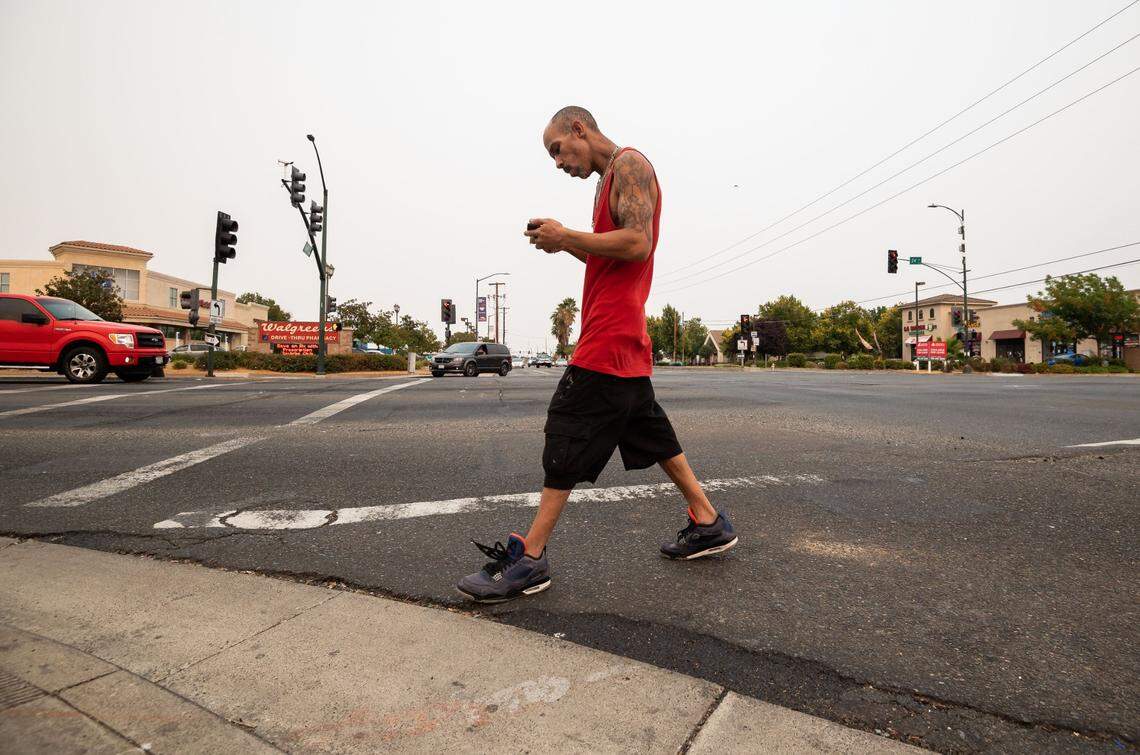 Marcos Alexander Colon, of south Sacramento, crosses Florin Road at 24th Street on Aug. 19. “i walk past this intersection all the time, and yeah it’s crazy. People don’t stop, people don’t wait for other people when it’s their turn or anything like that,” he said.