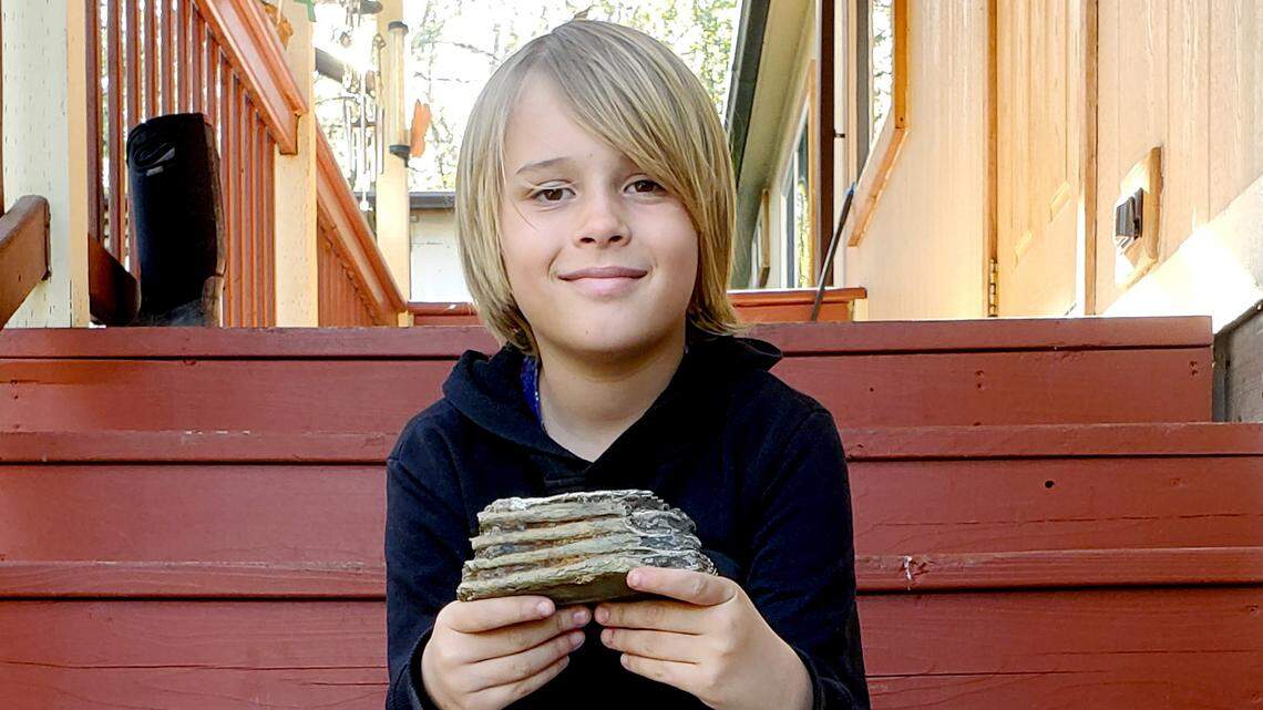 Jeremiah Longbrake, 9, found a mammoth tooth fragment while exploring his grandmother’s backyard.