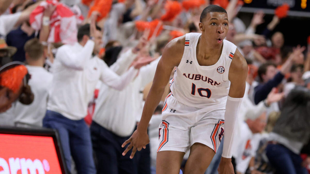 FILE - Auburn forward Jabari Smith (10) reacts after making a 3-pointer against Alabama during the first half of an NCAA college basketball game Tuesday, Feb. 1, 2022, in Auburn, Ala. Houston, Detroit and Orlando share the best odds to win the draft lottery on Tuesday, May 17, 2022, and the No. 1 pick in the NBA draft. All three are already loaded with young players, even before the possibility of adding someone like Chet Holmgren, Paolo Banchero or Jabari Smith. (AP Photo/Butch Dill, File)