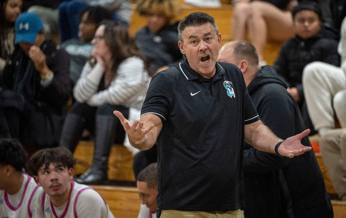 Sheldon coach Joey Rollings communicates with a referee during a Delta League opener game against Jesuit on Wednesday at Sheldon High School.