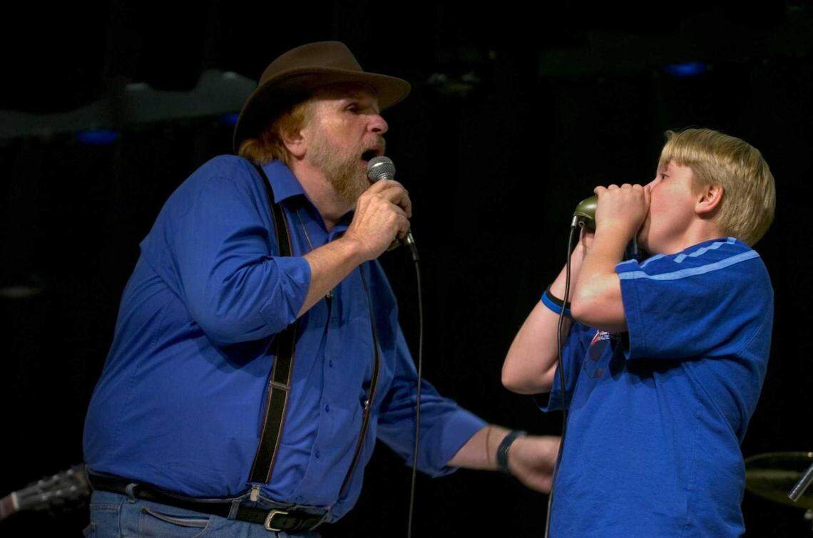 Mick Martin, left, performs alongside 13-year-old harmonica player Kyle Rowland in 2006 during a Blues in the Schools program at Helen Carr Castello Elementary School in Elk Grove. Martin mentored Rowland after inviting him onstage as a 10-year-old during the 2004 Sacramento Jazz Jubilee, beginning a close musical bond that lasted the rest of Martin’s life.