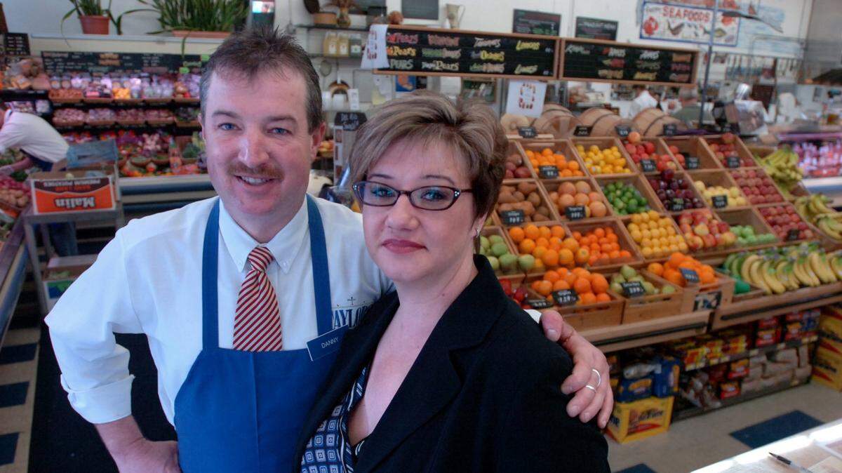 Dan and Kathy Johnson, pictured in 2007, co-owned Taylor’s Market in Land Park. Kathy died in February and her family has posted a touching obituary, opening up about mental illness and addiction.