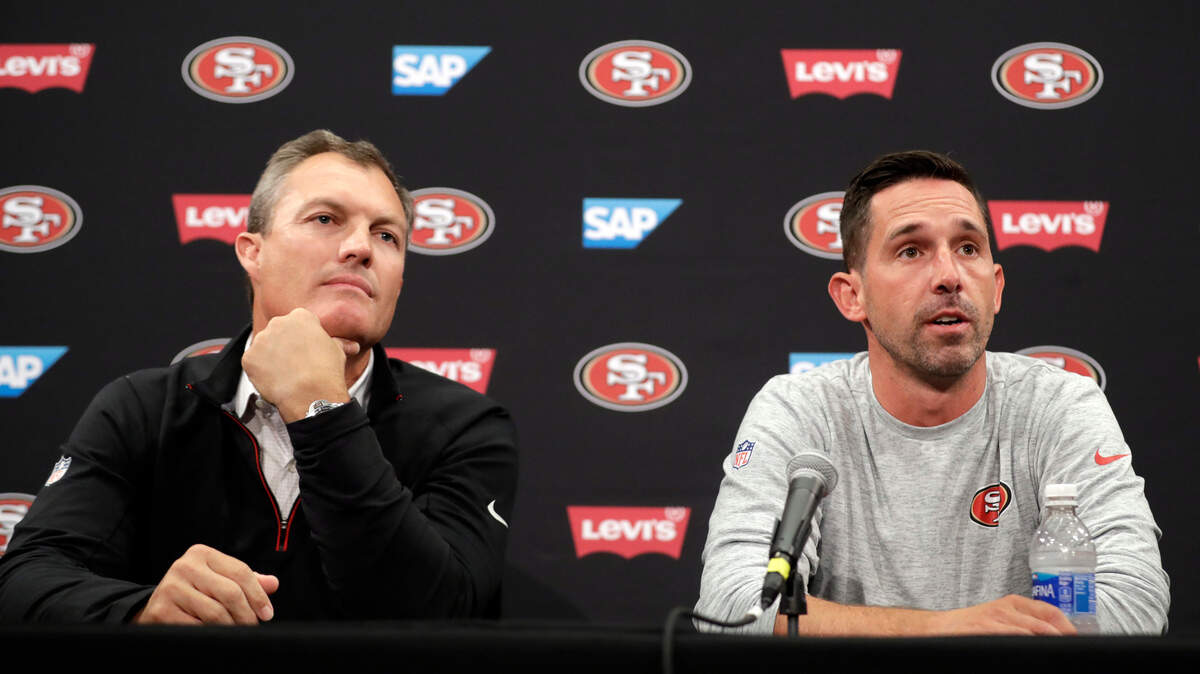 San Francisco 49ers head coach Kyle Shanahan, right, and general manager John Lynch field questions during the NFL team’s football training camp Thursday, July 27, 2017, in Santa Clara, Calif. (AP Photo/Marcio Jose Sanchez)