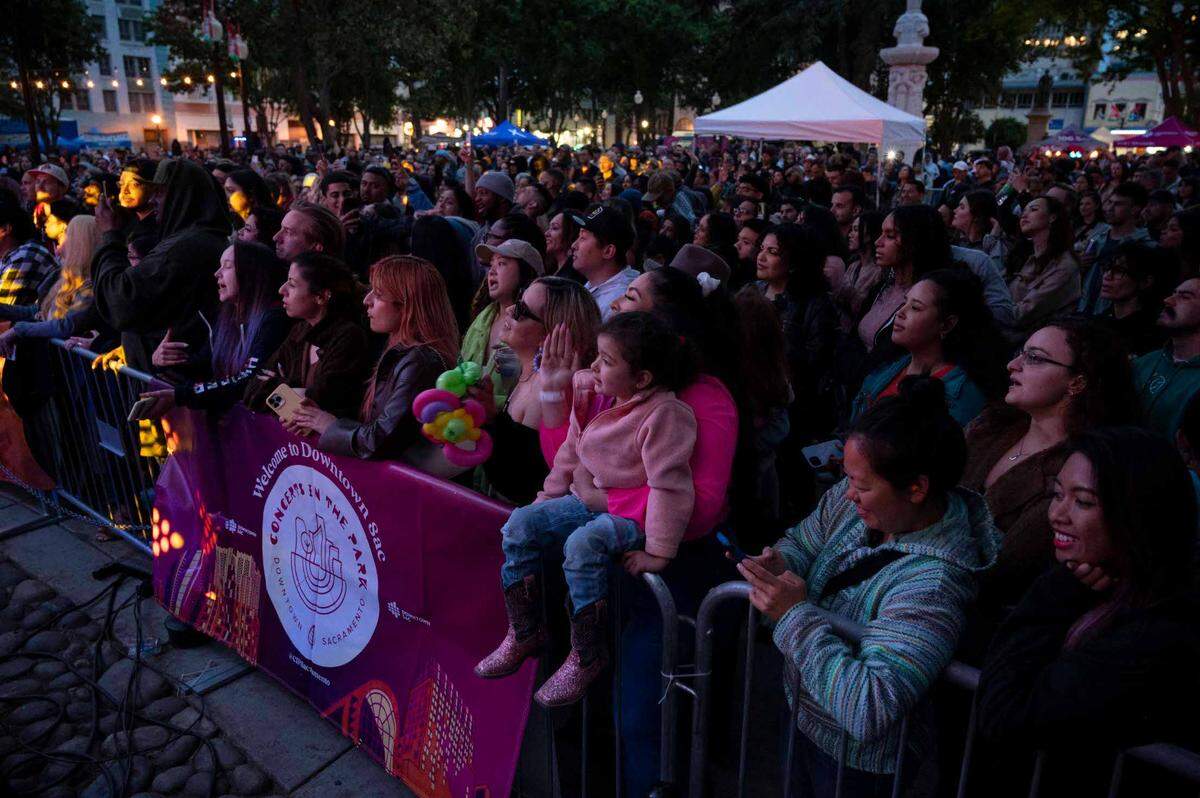 Cesar Chavez Plaza is packed with concert goers of all ages for the opening night of the Concert in the Park series that kicked off on Cinco de Mayo on Friday, May 5, 2023.
