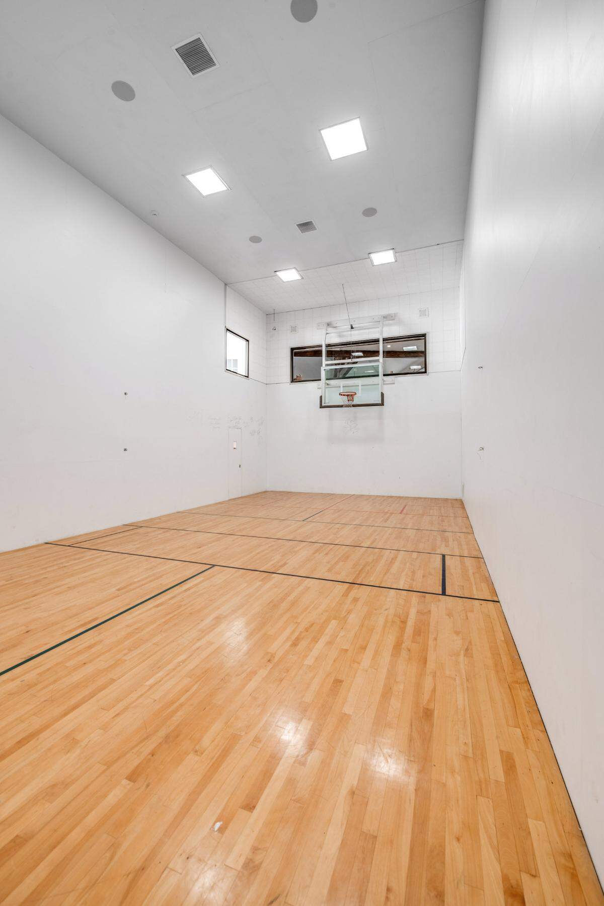 A home built by Magic Johnson without an indoor basketball court? Impossible.