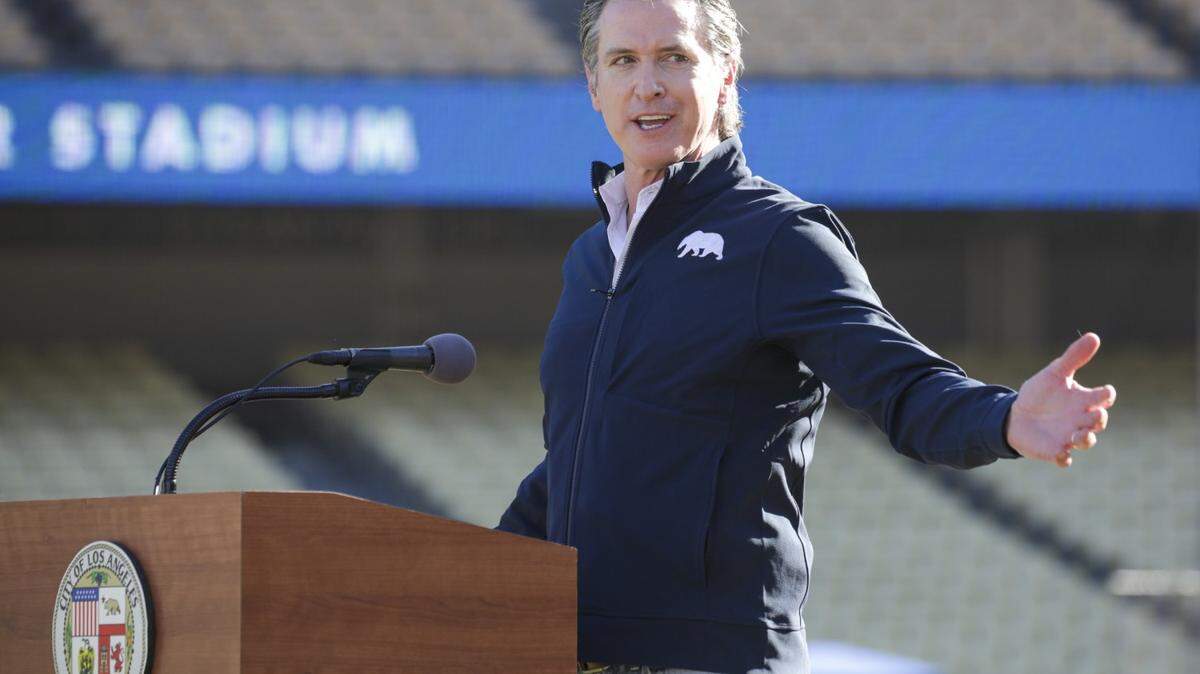California Gov. Gavin Newsom addresses a press conference held at the launch of mass COVID-19 vaccination site at Dodger Stadium on Jan. 15, 2021, in Los Angeles. (Irfan Khan/Los Angeles Times/TNS)