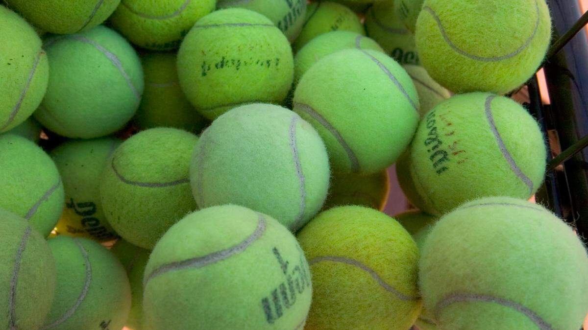 FILE -- A basket of practice tennis balls.