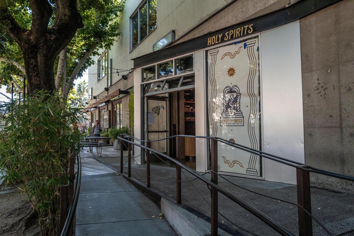 Michael Hargis, owner of Holy Spirits, said you can purchase bottles of rare and allocated spirits to go for a good price in his new boutique bottle shop and cocktail bar in midtown.