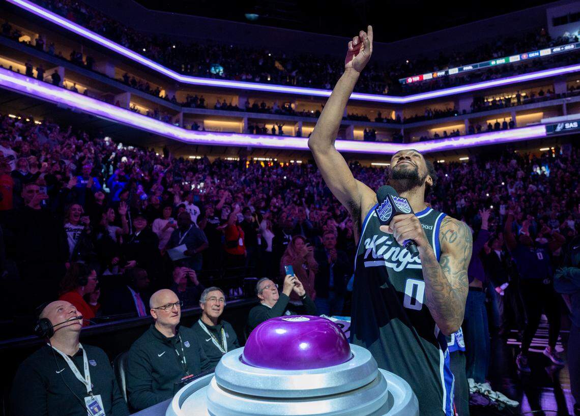 Sacramento Kings Malik Monk point to the sky after light the beam during the Kings 131-129 win over the San Antonio Spurs at Golden 1 Center on Thursday, March 7, 2024 in Sacramento.