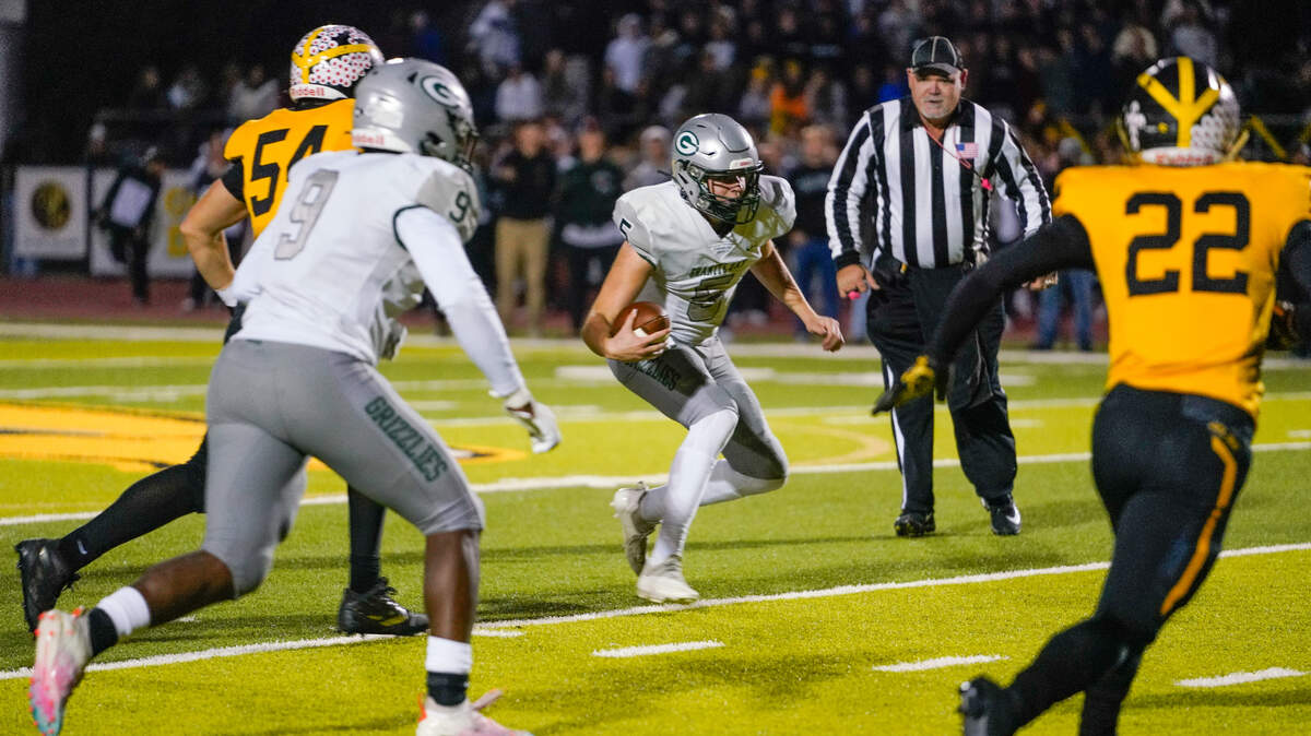 Granite Bay quarterback McCade Long (5) had three total touchdowns in Granite Bay’s 21-16 win over Del Oro on Friday night in Loomis.