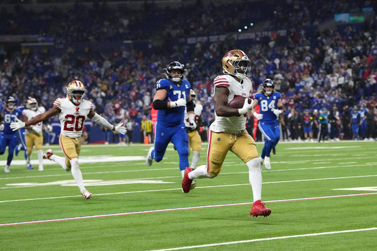 INDIANAPOLIS, INDIANA - DECEMBER 22: Dee Winters #53 of the San Francisco 49ers intercepts the pass for a touchdown during the fourth quarter of the game against the Indianapolis Colts at Lucas Oil Stadium on December 22, 2025 in Indianapolis, Indiana. (Photo by Dylan Buell/Getty Images)