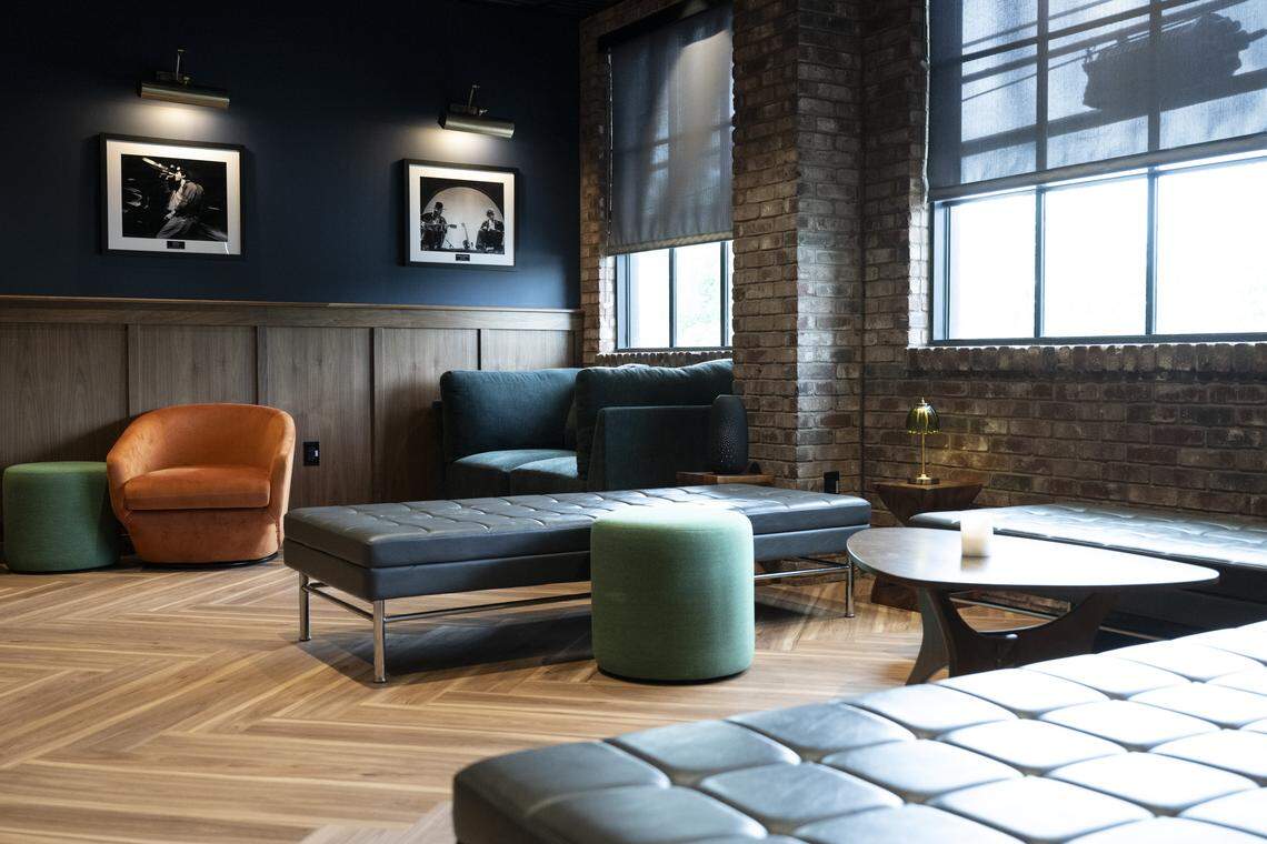 Concert images line the walls at Studio 24, a new VIP section at music venue Channel 24, in Sacramento on Tuesday, April 21, 2026.