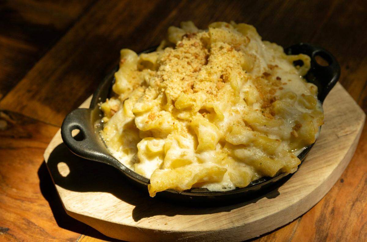 “Not Your Mom’s Mac” made with Parmigiano-Reggiano 2 yr., Grand Cru Gruyere, Black Diamond 5 yr. Cheddar and bread crumbs served at The Rind on Friday, May 24, 2024 in Sacramento.