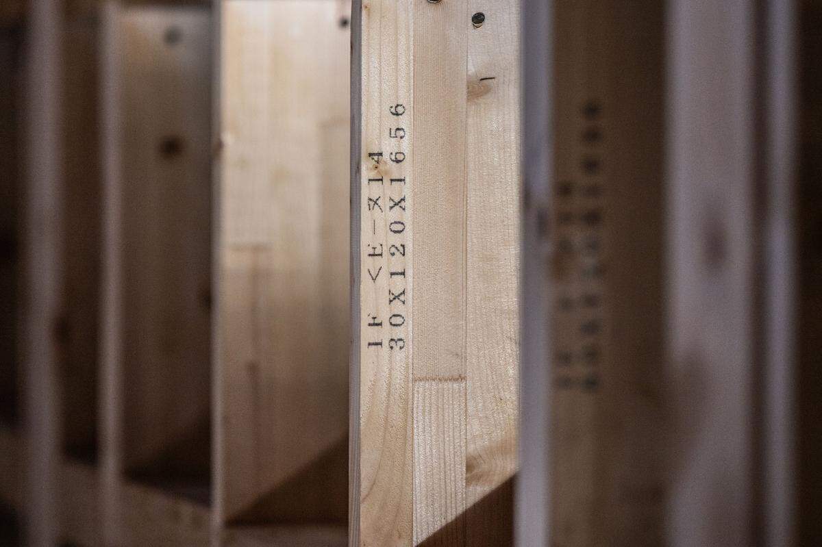 Laminated beams form a wall in a model homes in Folsom’s Shawood development. The homes are being built with Sekisui House’s proprietary system of 120mm glued wood strips. which the company says “eliminates the cracks and imperfections in the source wood” to improve the strength of the structure.
