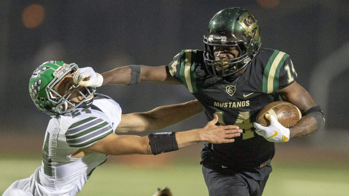 Jehiel Budgett, right, plays running back and defensive back for Monterey Trail. He signed a letter of intent to play football at UC Davis.