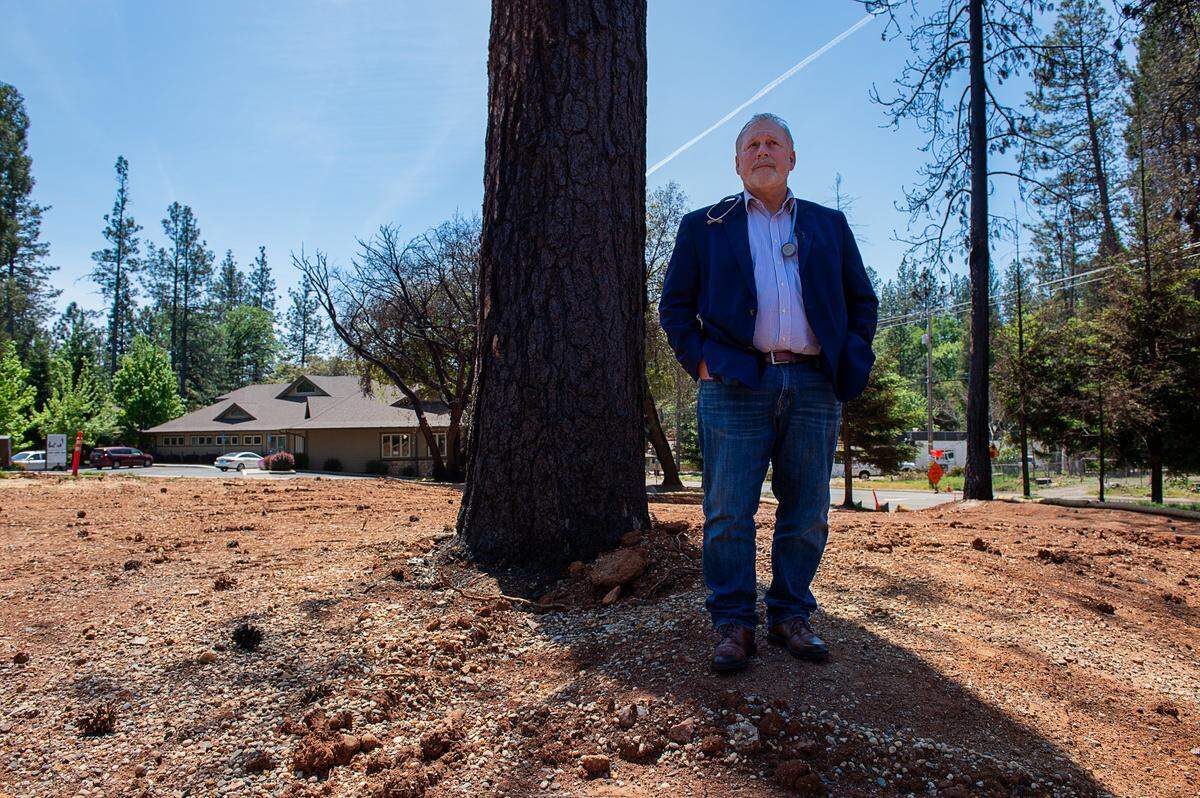 Dr. Richard Thorp, president of Paradise Medical Group stands on the former location of one of their medical offices on Monday, May 6, 2019 in Paradise.