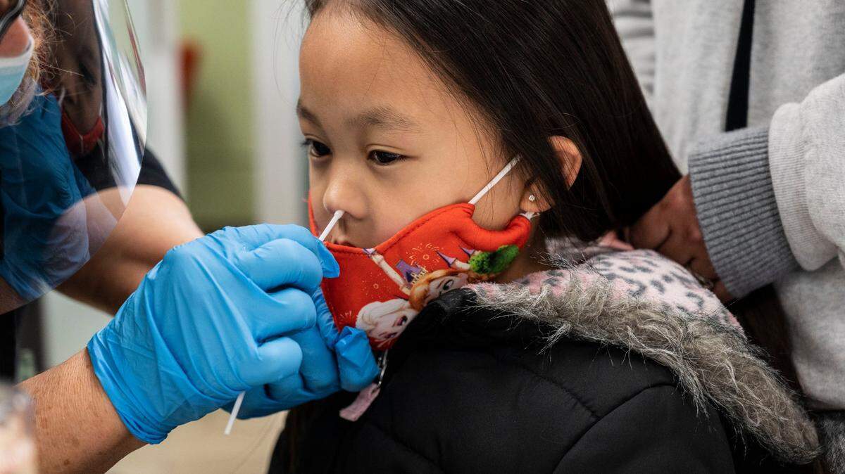 Child getting tested for COVID-19. (Bee file photo)