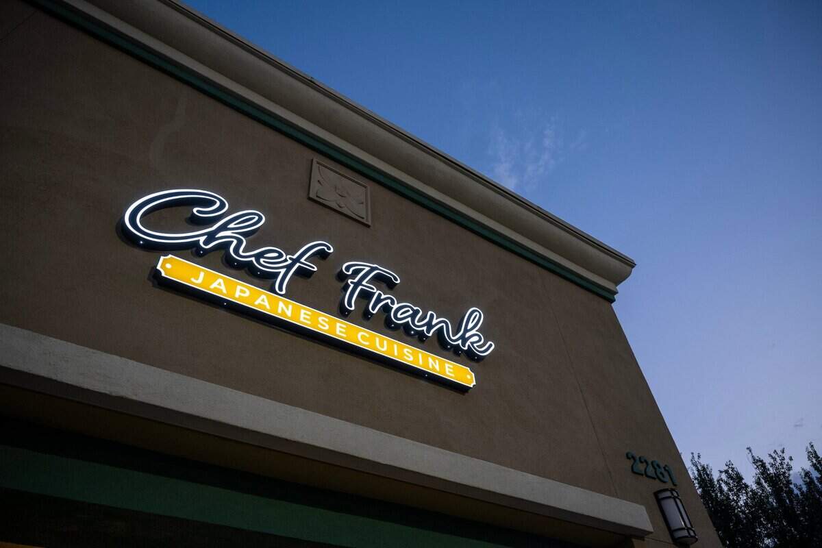 The sign for Chef Frank Japanese Cuisine in North Natomas glows last month.