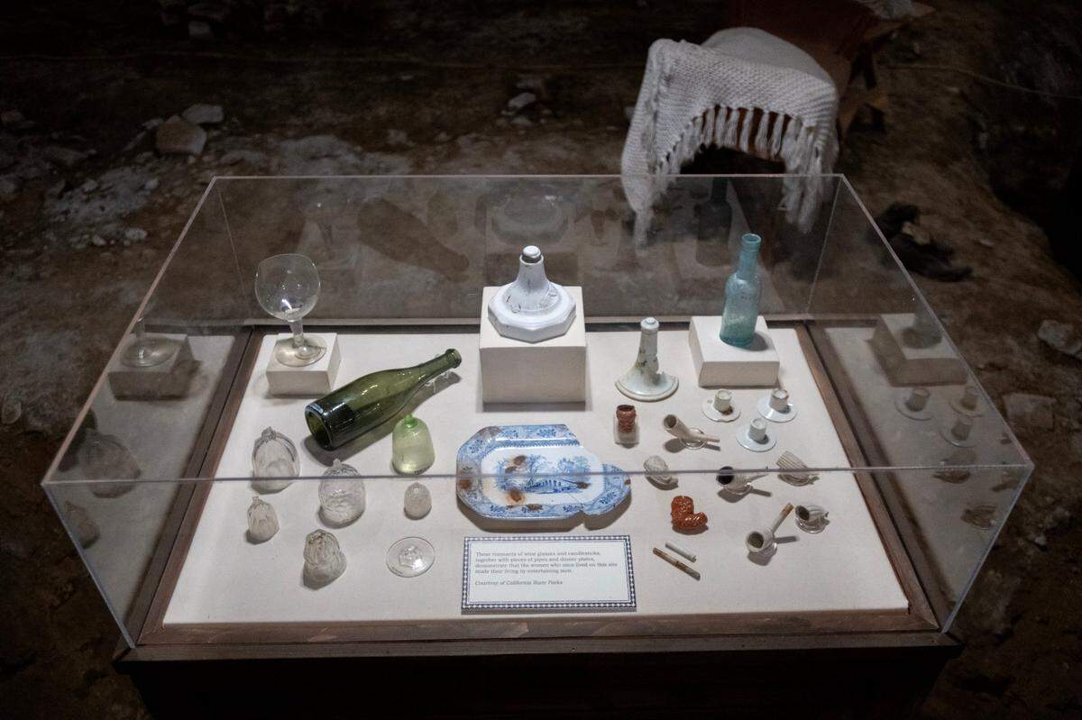 Artifacts from Old Sacramento in the 1800s are displayed on Aug. 23, 2024, in the underground area of the Hall, Luhrs & Company building.