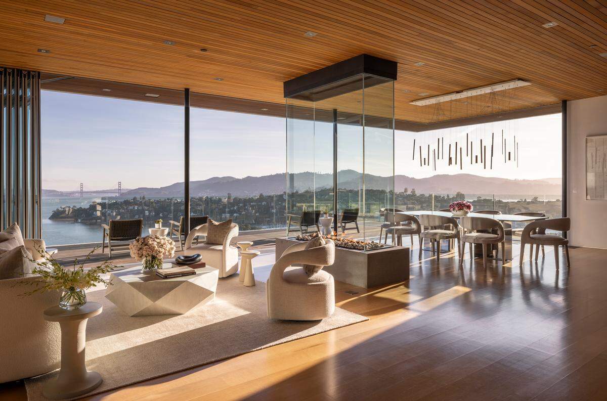 The living room and dining room appear to hover above the landscape.