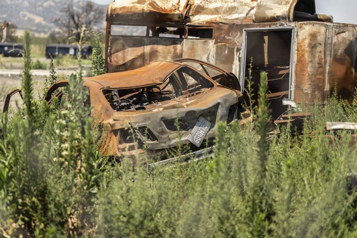 Burnt cars remain on the property in Esparto on Thursday, June 18, 2026, from the Devastating Pyrotechnics fireworks fire and explosion where seven people died last year.