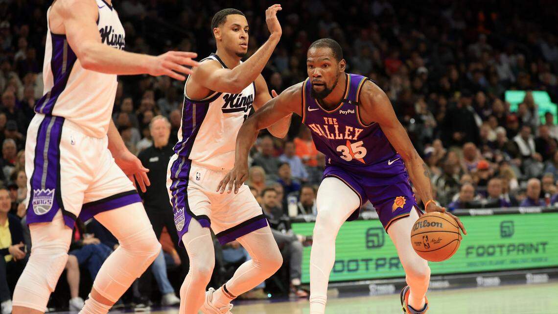 Mar 14, 2025; Phoenix, Arizona, USA; Phoenix Suns forward Kevin Durant (35) dribbles the ball against the Sacramento Kings during the first half at Footprint Center. Mandatory Credit: Mark J. Rebilas-Imagn Images