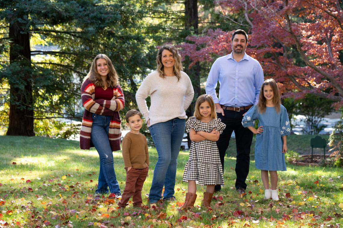 Union-supported former educator Kara Lofthouse, who won a seat on the Folsom Cordova Unified School District board in November’s election, stands with her family – Ava, 15, Kai, 3, Sophia, 6, husband Dustin Lofthouse, and Maya, 8 – at her Folsom home on Wednesday.