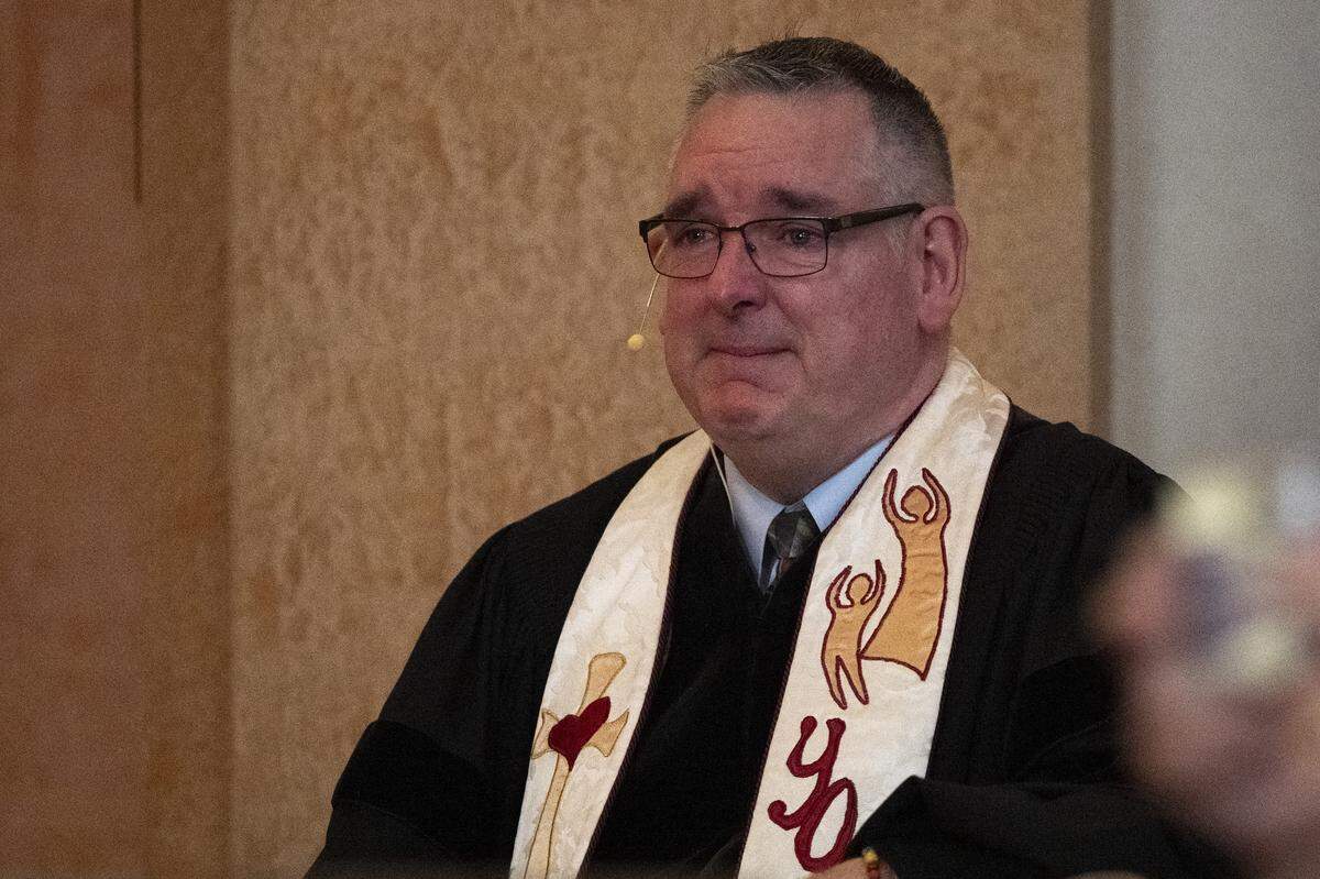 Pastor David Bocock tears up during the final service of Pioneer Congregational United Church of Christ at their church on L Street in Sacramento on Sunday, May 31, 2026.
