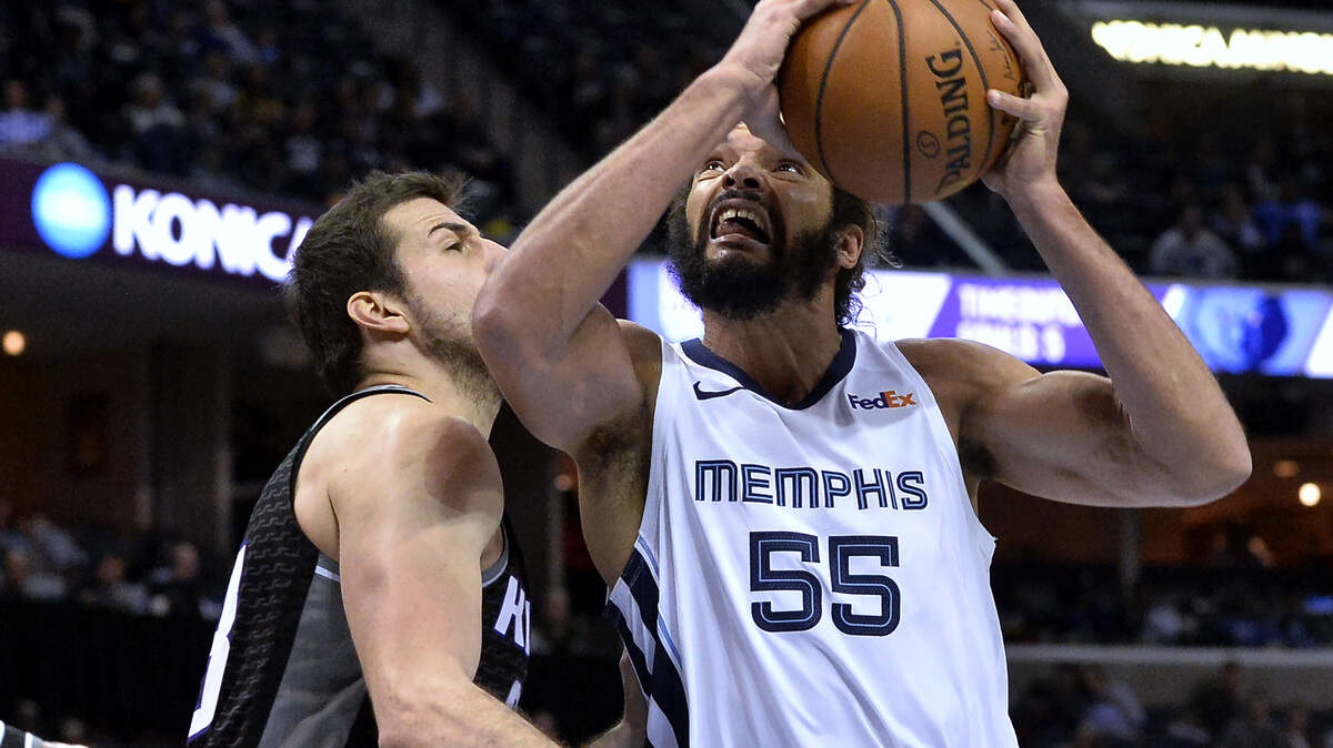 Memphis Grizzlies center Joakim Noah (55) drives against Sacramento Kings forward Nemanja Bjelica during the second half of an NBA basketball game Friday, Jan. 25, 2019, in Memphis, Tenn. (AP Photo/Brandon Dill)