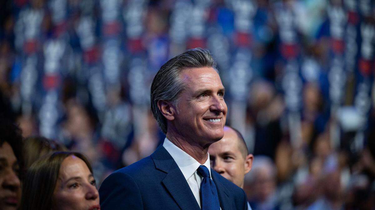 California Gov. Gavin Newsom smiles as U.S. President Joe Biden delivers remarks at the 2024 Democratic National Convention in Chicago on Monday, Aug. 19, 2024.