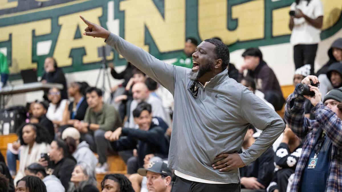 Monterey Trail Mustangs coach Robert Fields calls out to his team during the first half of the game on Wednesday, Jan. 10, 2024, at Monterey Trail High School in Elk Grove.
