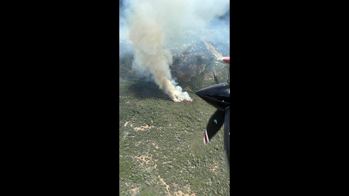 Cal Fire surveys the Double Fire which broke out near a small community in Yuba County on Thursday.