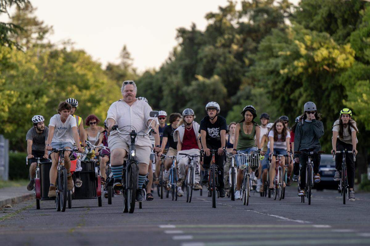 Bicyclists ride the streets of Davis to memorials for bike riders killed in crashes during a memorial ride on Wednesday.