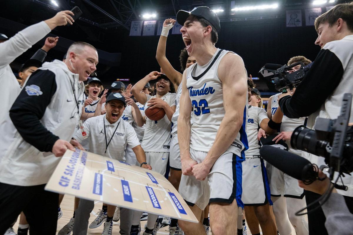 The Rocklin Thunder’s Mark Lavrenov (32) celebrates with his teammates defeating the Jesuit Marauders in the 2025 Sac-Joaquin Section Division ll championship at Golden 1 Center.