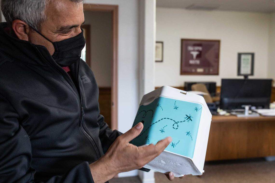 Mustapha Debboun, general manager of the Delta Mosquito and Vector Control District, holds a prototype for a mosquito-abatement product Oxitec eventually hopes to sell directly to U.S. consumers. If all goes as planned, consumers would add water, and the companyâs engineered mosquitoes would spring to life.