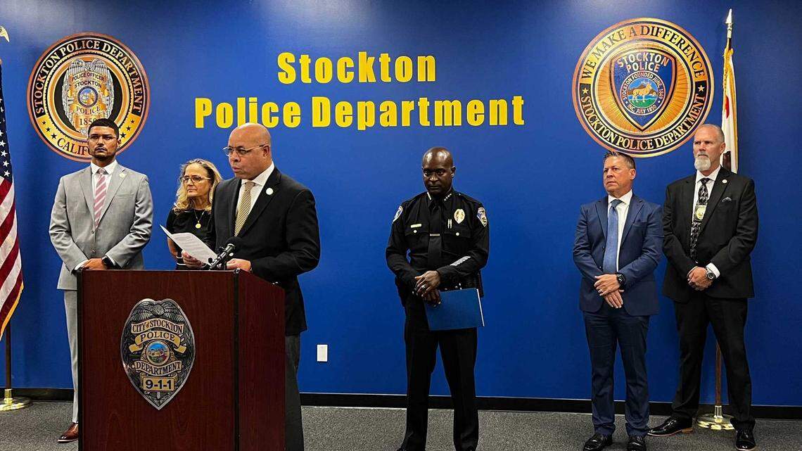 Authorities announce the arrest of Wesley Brownlee, 43, Saturday, Oct. 15, 2022, in Stockton, Calif., in connection with a series of killings in the city and Oakland that left six people dead since 2021. Officials making the announcement include, from left, Stockton Mayor Kevin Lincoln; San Joaquin County District Attorney Tori Verber Salazar; city manager Harry Black; police Chief Stanley McFadden; Ron Freitas, DA-elect for San Joaquin County; and Stockton police Chief of Investigations James Bojko.