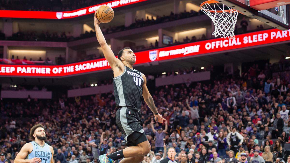 Sacramento Kings forward Trey Lyles (41) dunks the ball on the fast break in the second half against the Memphis Grizzlies in the NBA basketball game Monday, Jan. 23, 2023, at the Golden 1 Center in Sacramento. Lyles had 24 points and seven rebounds. The Kings win 133-100.