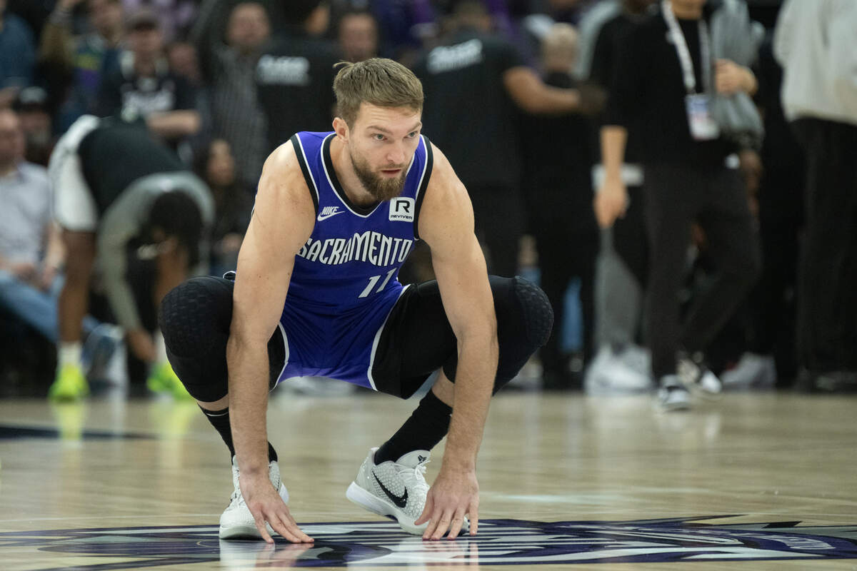 Sacramento Kings center Domantas Sabonis (11) stretches before the start of the NBA game at Golden 1 Center on Sunday, Nov. 24, 2024.